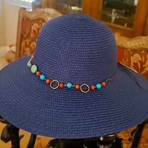 Navy straw hat with turquoise trim